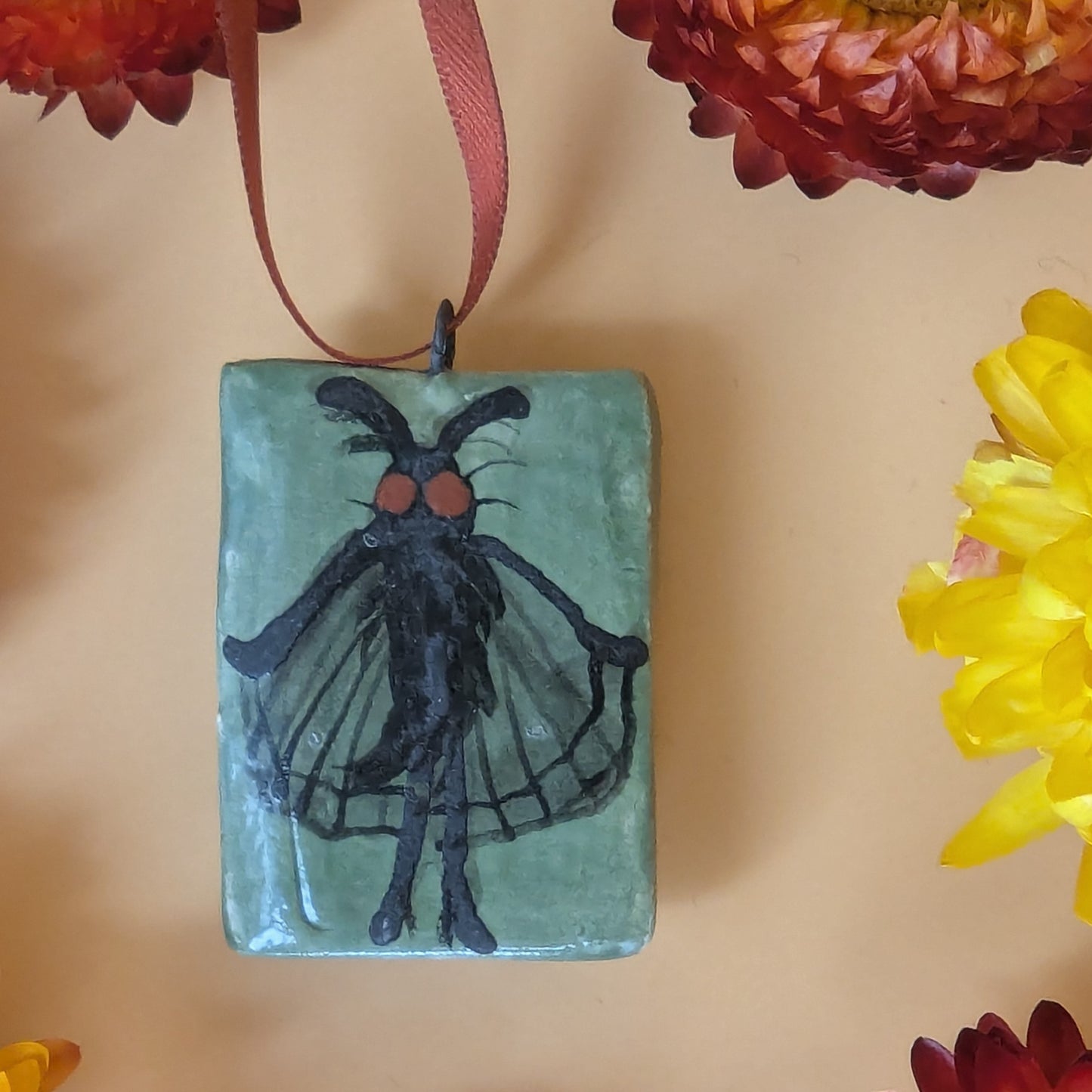 'Small Moth Man' Ceramic Decoration by Ciara Veronica Dunne